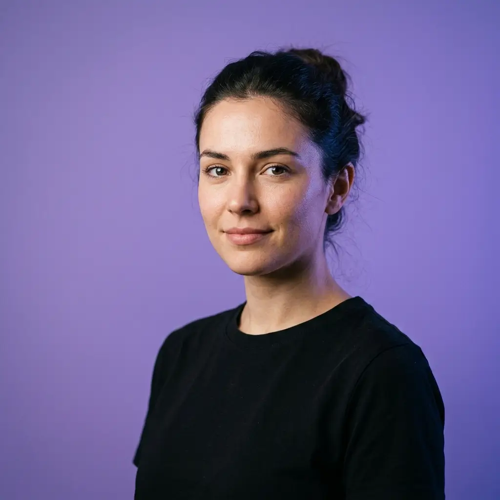 Creator in a purple studio portrait